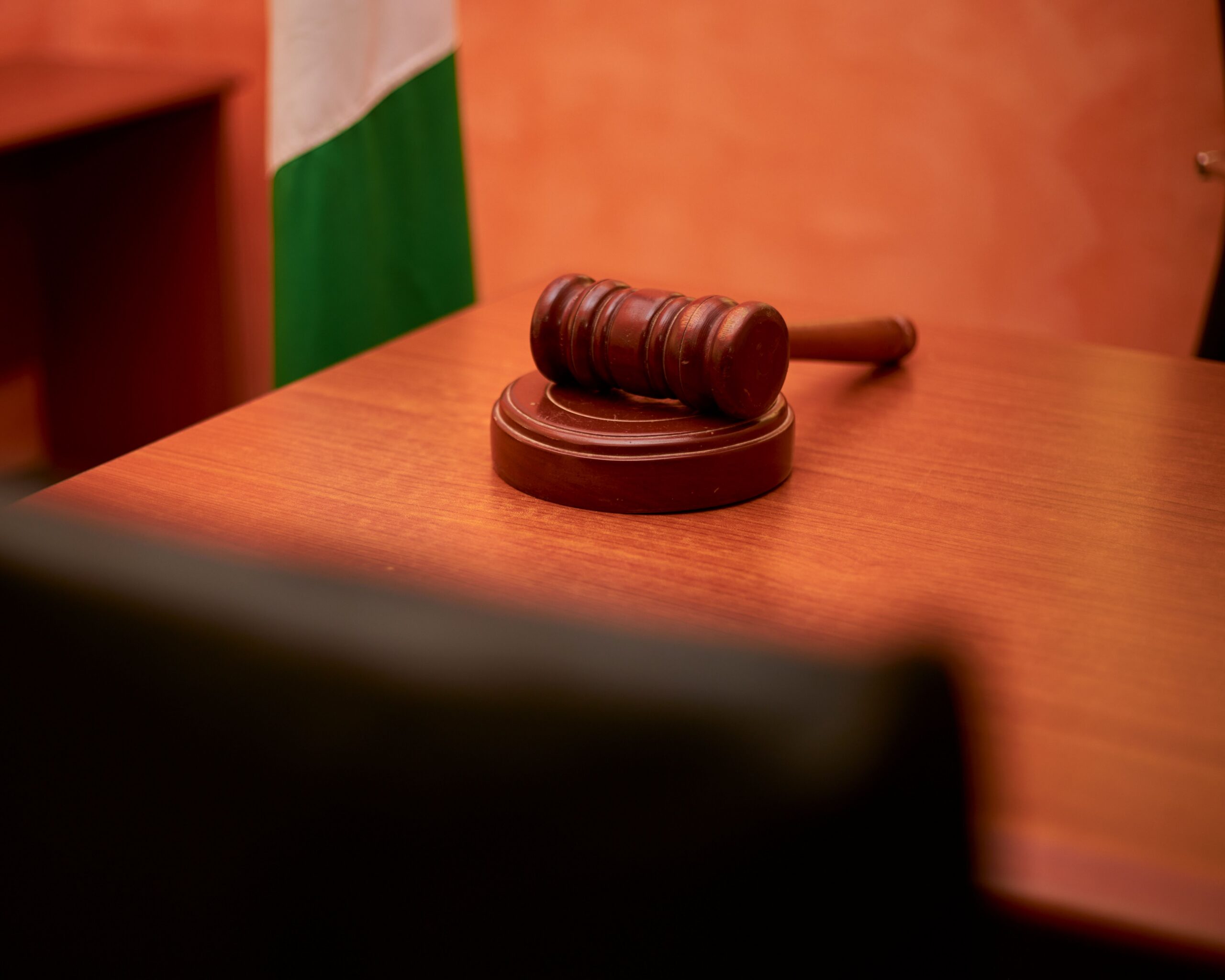 a gavel rests on a wooden table. A suspected KZN serial rapist has his court date moved to September 28th.