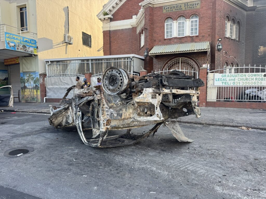4 cars that were set alight last night in Durban central are still at the scene with some debris.